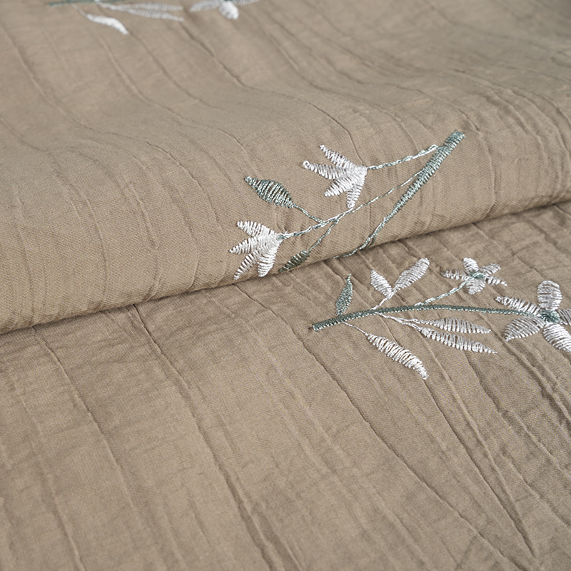 Vải nhăn hoa lan thêu hạt đào